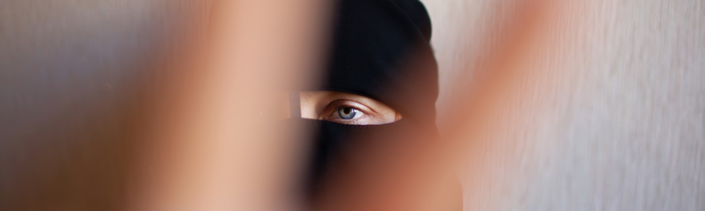 blurred photo of a woman in burqa