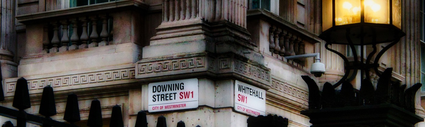Copyright: Peter Toporowski/Flickr. Downing street sign with fence