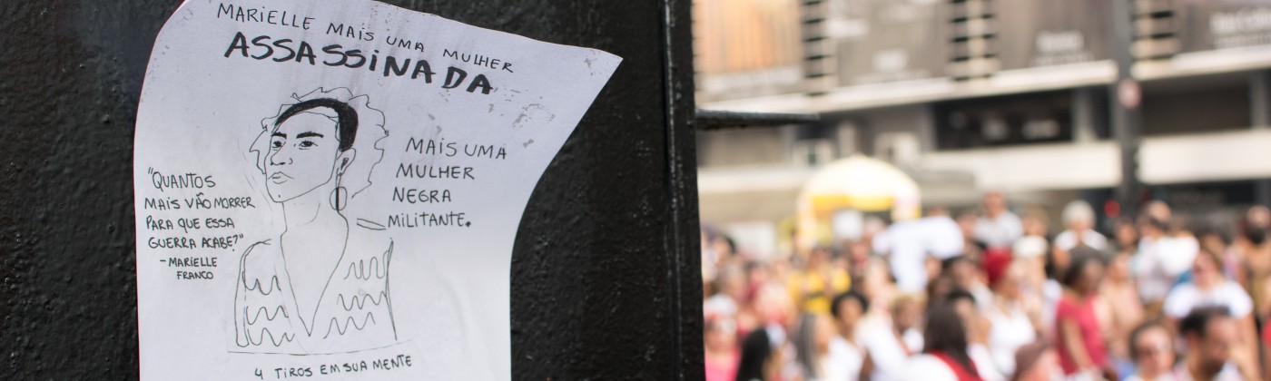 A flyer memorializing the murder of a human rights defender